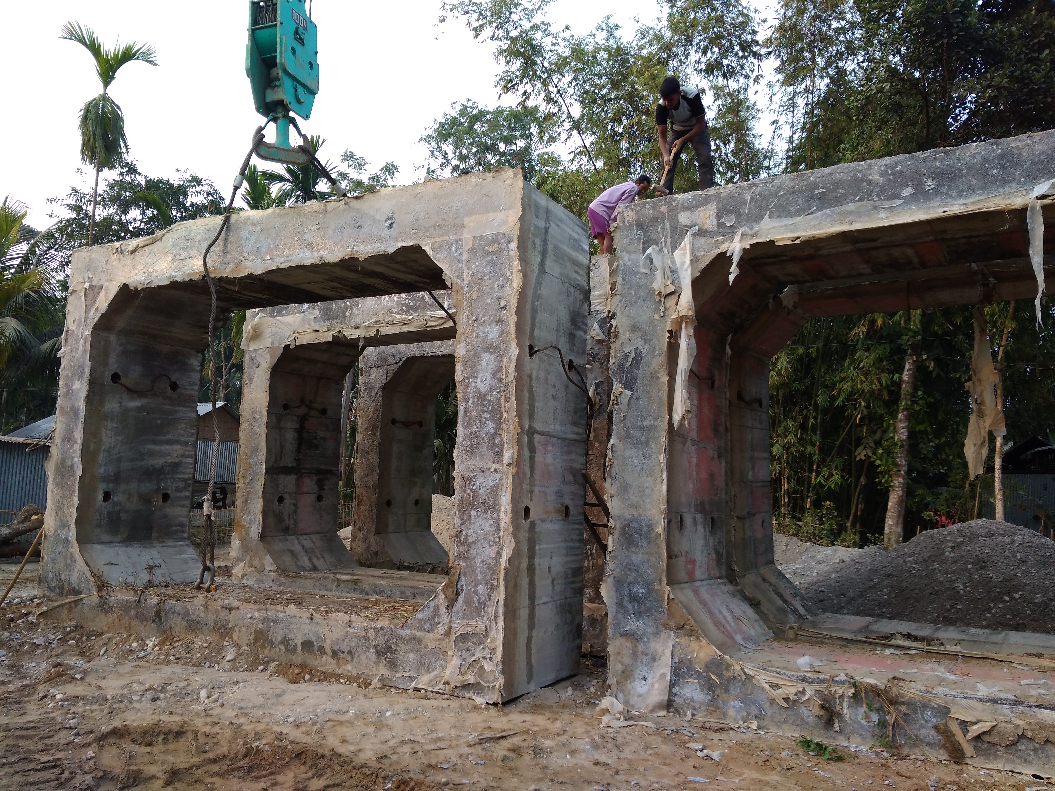 Construction workers laying foundation
